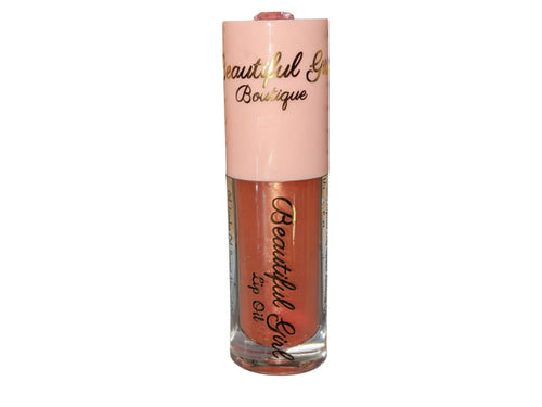 24k Magic Color-Changing Lip Oil - Personalized Shine That Adapts to You.